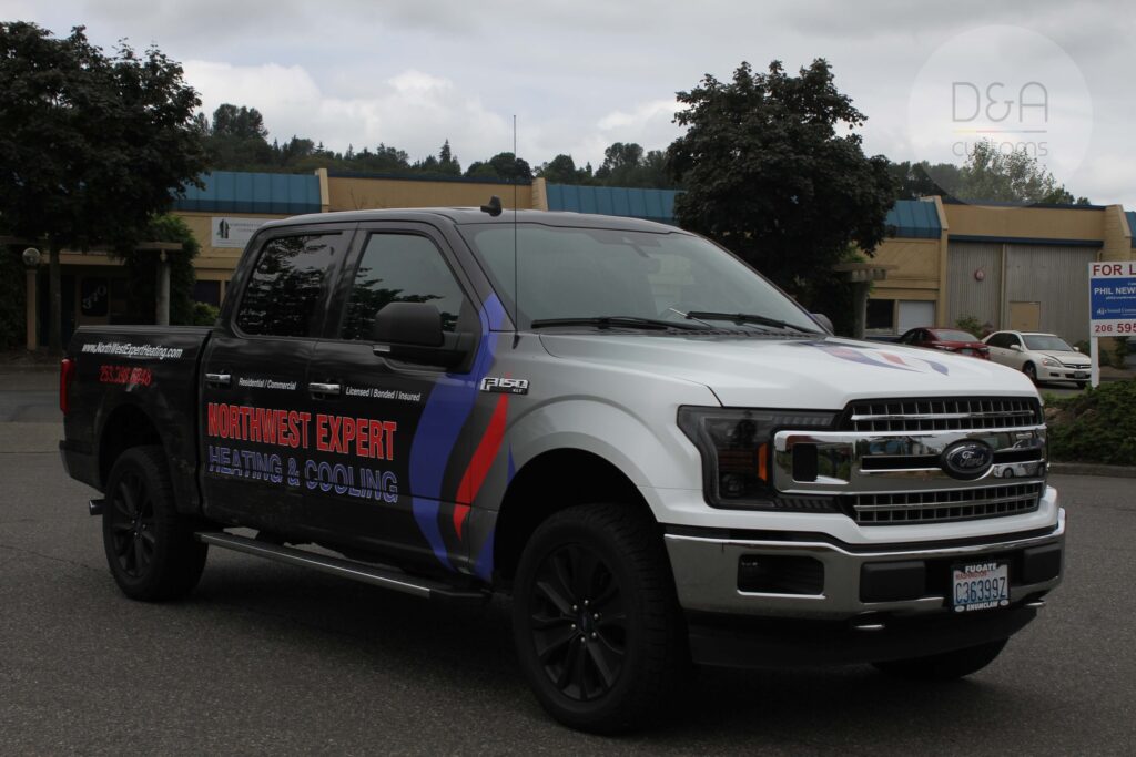 Partial truck vehicle wrap covering rear and side panels