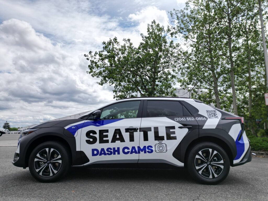 Custom vehicle graphics installed on service van in Seattle